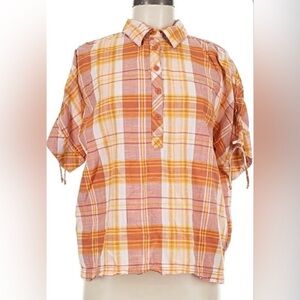 Columbia plaid short sleeve top. Ties on sleeves. Logo on chest. 100% cotton.